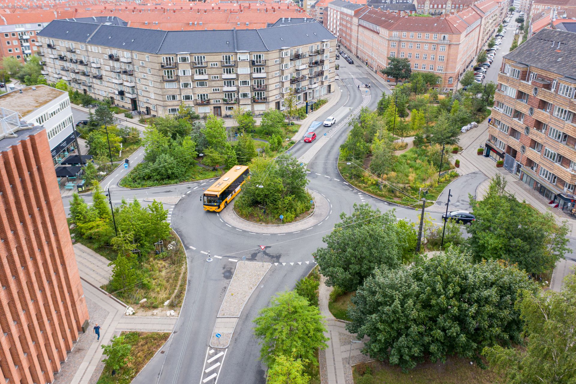 Bird's eye view on Sankt Kjelds Square in Copenhagen - the new design turned the busy roundabout into a urban climate forest and has reduced the urban heat island effect by 21%.